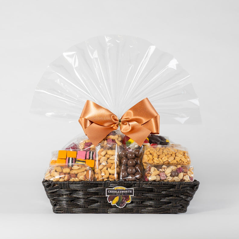Gift Basket filled with 19 Charlesworth nuts and CHocolates in a black reusable basket
