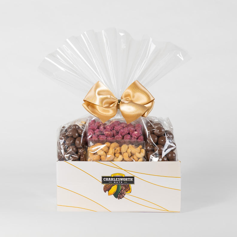Gift basket filled with chocolates and nuts, perfect for any occasion and for everyone. 