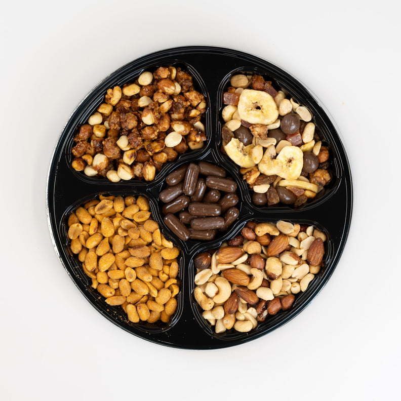 Party ack with chocolates, salted nuts and sweet treats