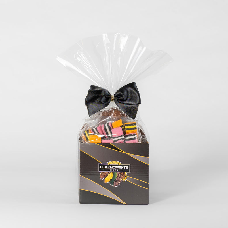 Gift Basket filled with chocolate bullets, chocolate honeycomb, licorice allsorts and raspberry lolly chocs