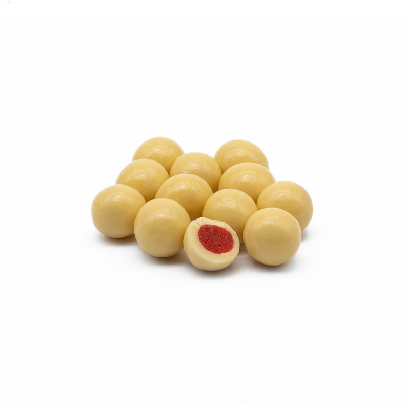strawberry flavoured fruit pieces coated in white chocolate