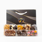 "Corporate gift bag filled with beer nuts, chocolate bullets, licorice, nut mix, and dried apricots." 