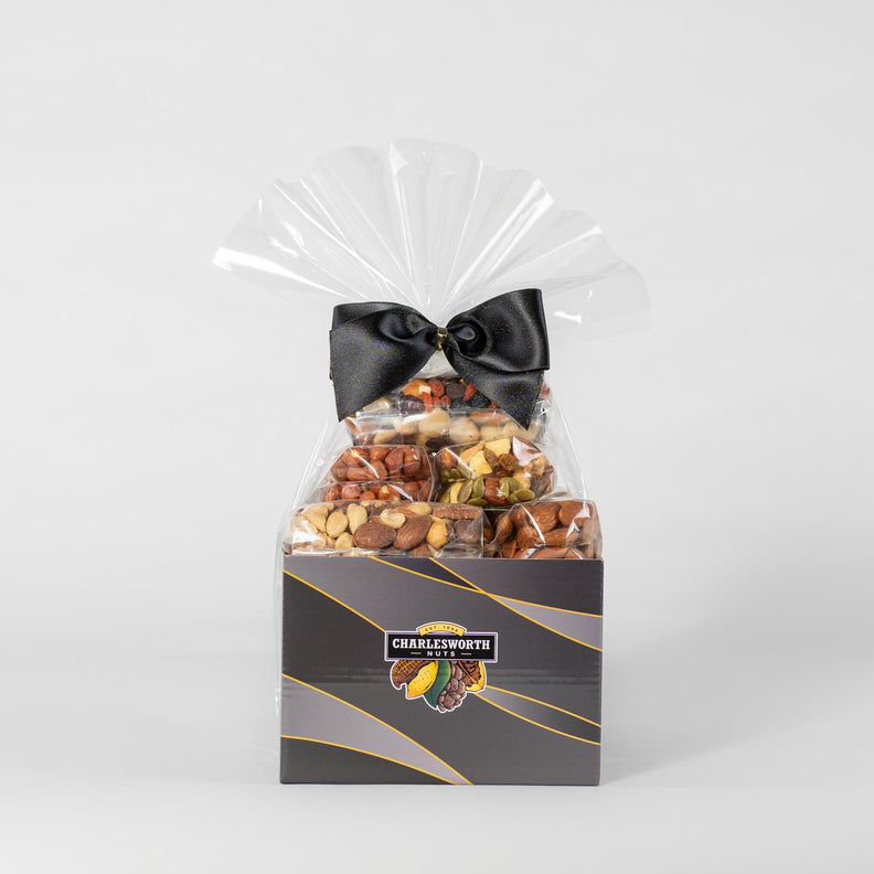 Healthy Gift Basket filled with 7 different nuts. Beautifully presented in a black box with black bow
