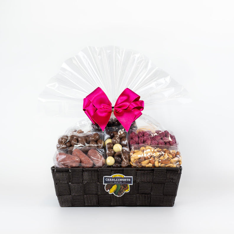 Mother 's Day Gift Basket filled with delicious Charlesworth Nuts and Chocolates. Beautifully presented in a black basket and pink ribbon.