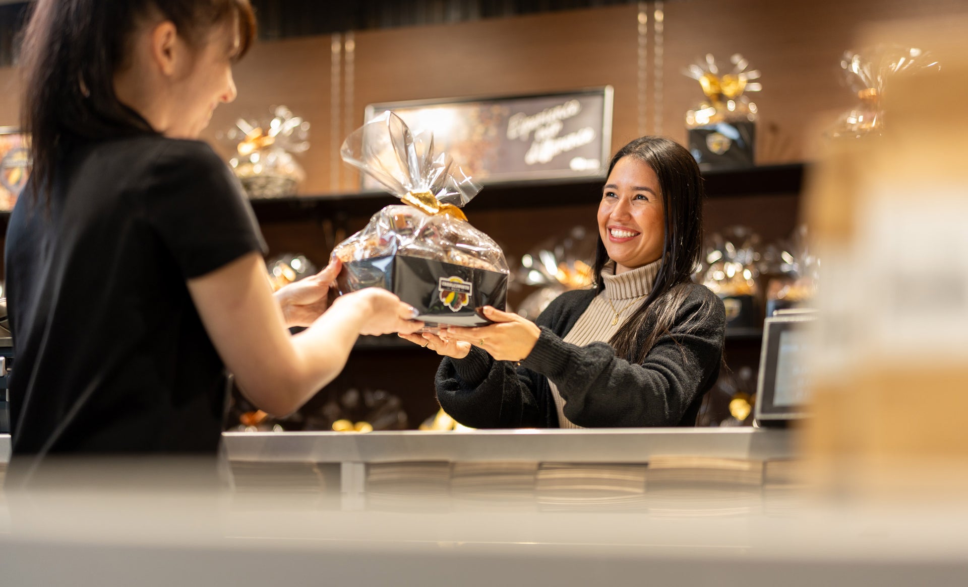 "Charlesworth client receiving a gift basket"