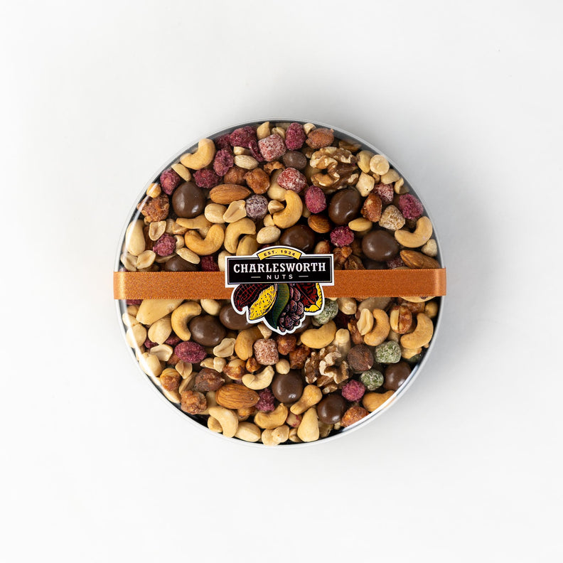 Charleys Choice a delicious treat packed in a clear gift pack featuring  raw, cooked, sugared and glazed nuts with sweet fruit.