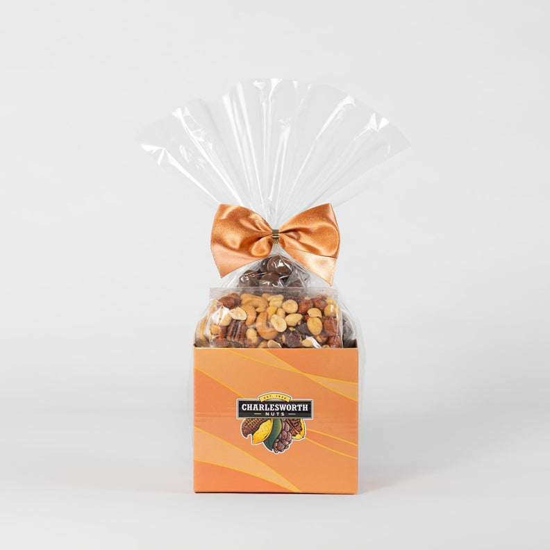 Gift Basket filled with choclate apricots, salted cashews, salted nut mix, and chocolate bullets