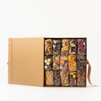 Christmas gift box filled with nuts and chocolates.
