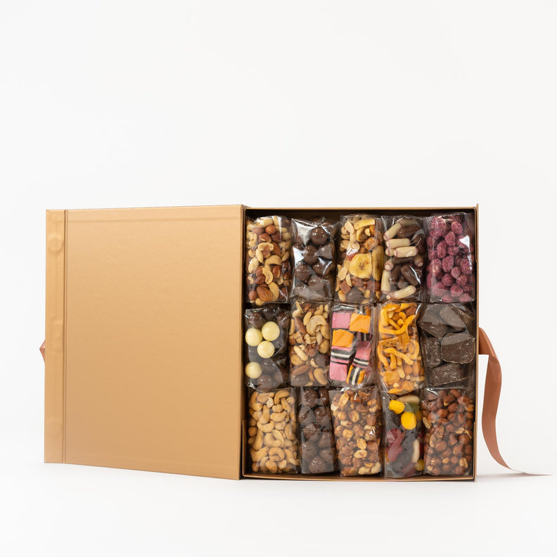 Christmas gift box filled with nuts and chocolates.