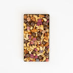 Gift pack filled with chocolates, peanuts, sugared peanuts and blanched almonds. 