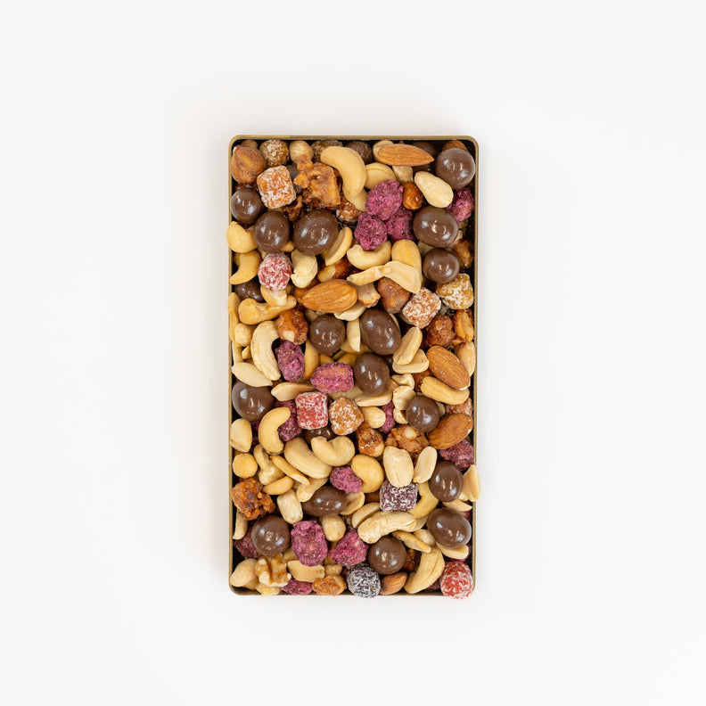 Gift pack filled with chocolates, peanuts, sugared peanuts and blanched almonds. 
