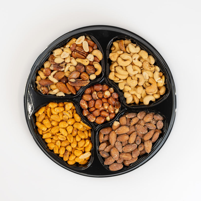 Platter with almonds, peanuts, cashews and beer nuts.
