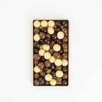 Christmas gift filled with milk, white and dark chocolate.