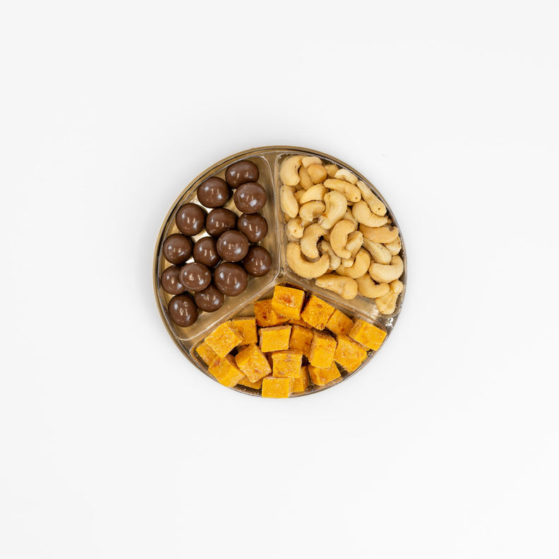 Choc, Nut 'n' Fruit Combo in a round, three-section gift tray with chocolate apricots, salted cashews and apricot fruit pieces.