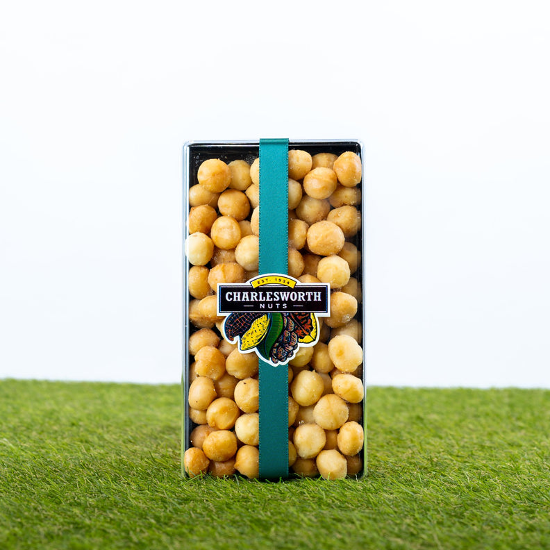 Father's Day gift box packed with premium macadamias tied with a dark green satin bow.