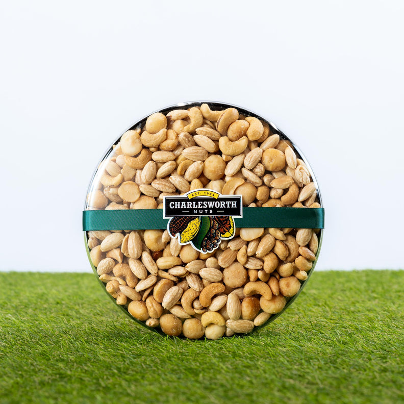 Charlesworth Nuts Salted 3 Of The Best Father's Day gift pack, macadamias, cashews and blanched almonds in a round clear container tied with a dark green satin ribbon.